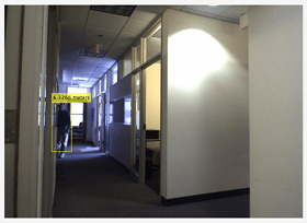 Camera image with distance measurement to an object in the image.